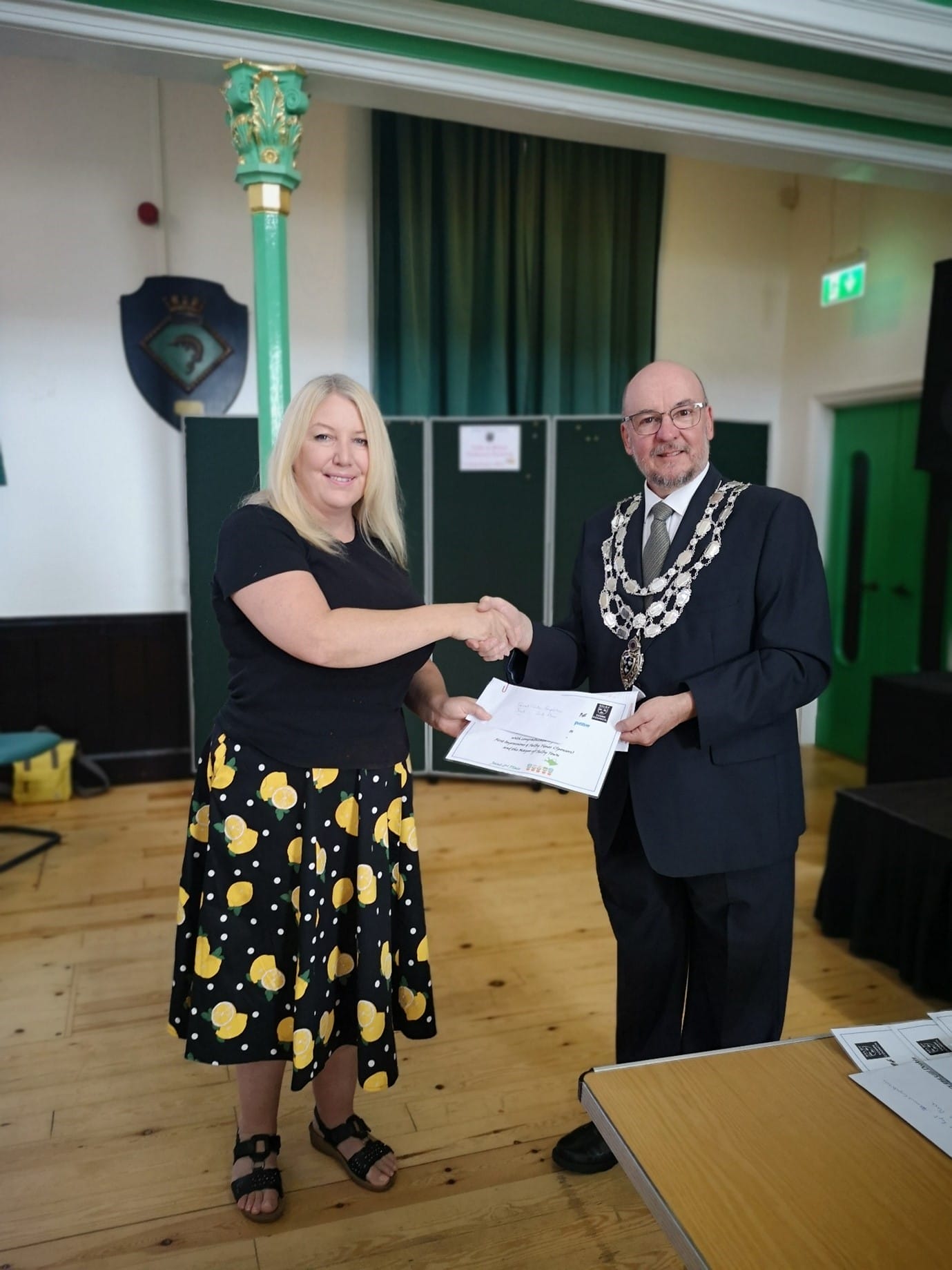 The mayor presenting a certificate to one of the winners of the Selby in Bloom allotment competition 3