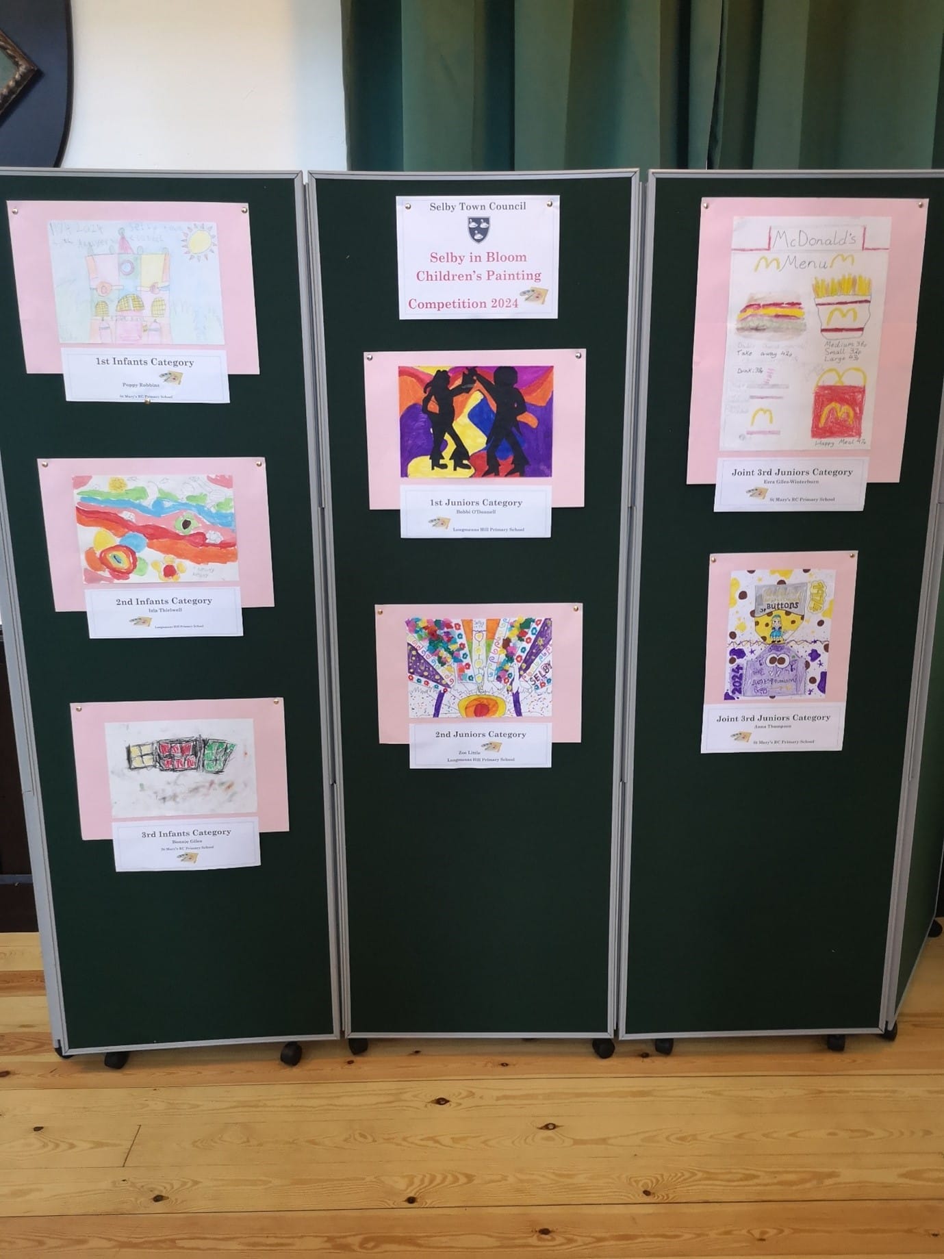 This photo shows the fabulous display of winning paintings