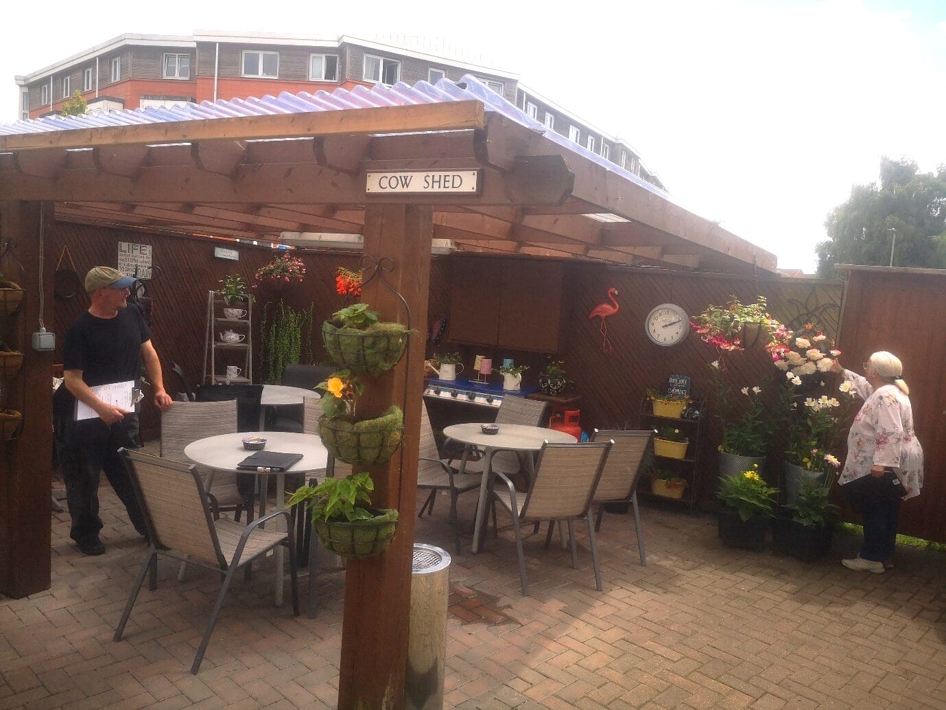This is a photo of the Mayor of Selby, Fred Matthews and Councillor Melanie Davis viewing a garden for the Selby in Bloom competition