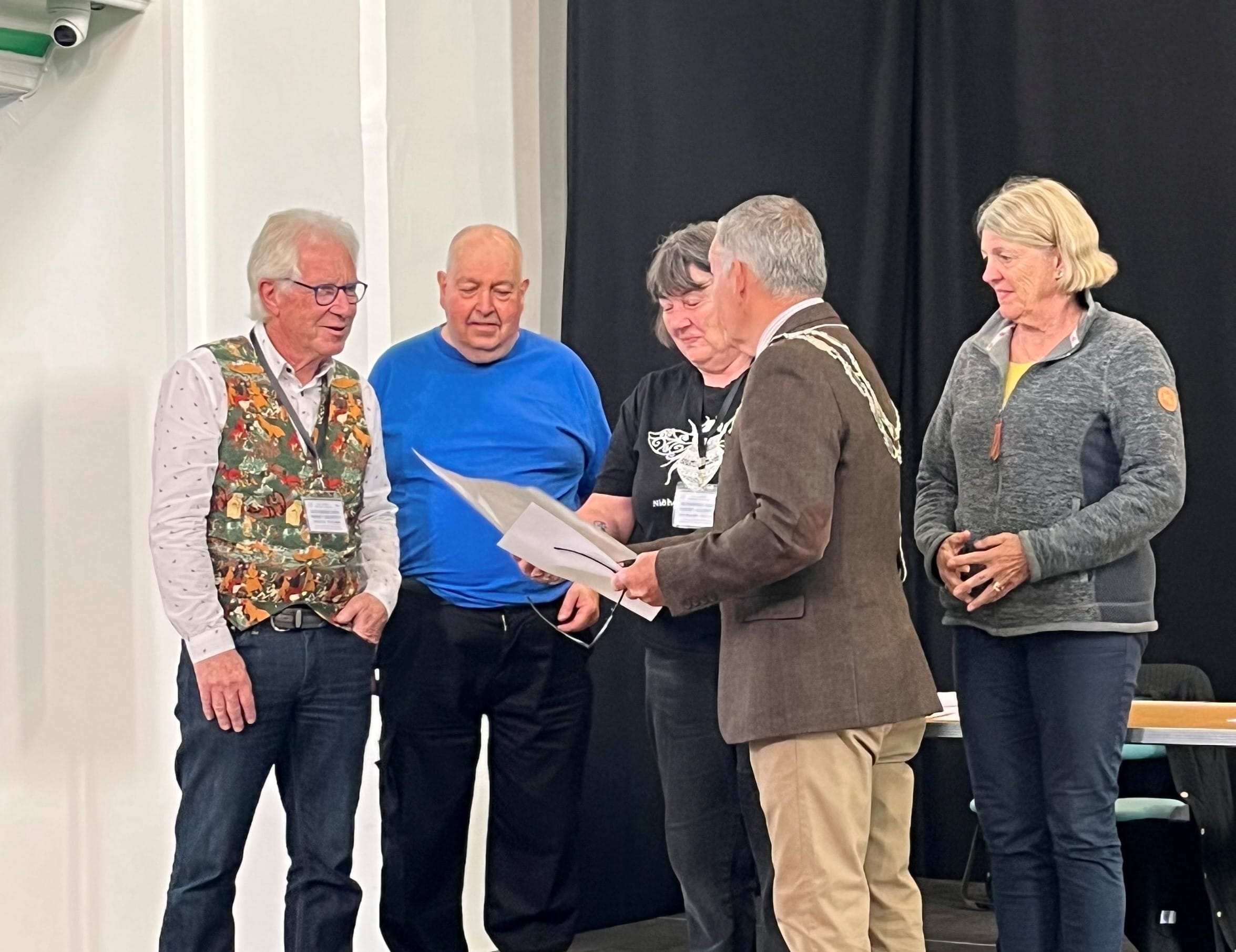 This photo shows members of the Selby & District Beekeepers Society receiving their grant from the Mayor, Councillor Keith Franks