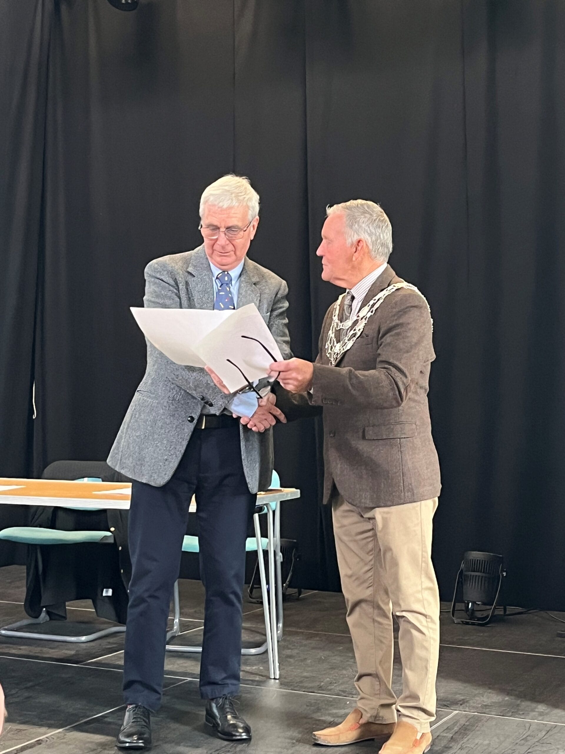 This photo shows a member of the Selby and District Rail Users Group receiving his grant form the Mayor, Councillor Keith Franks