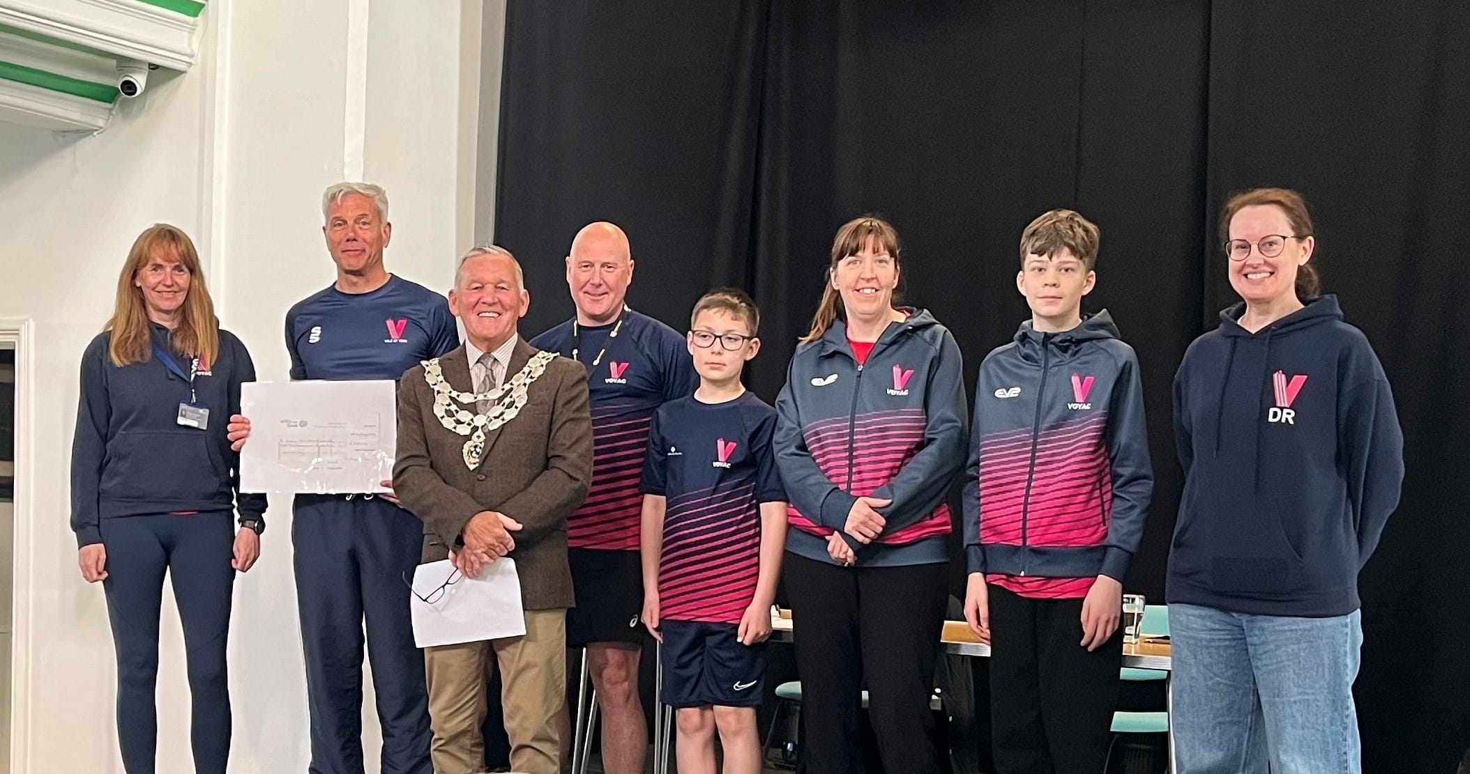 This is photo of some members of York Vale Athletics Society receiving their grant from the Mayor, Cllr Keith Franks