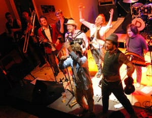 A photo of an artist at the Town Hall