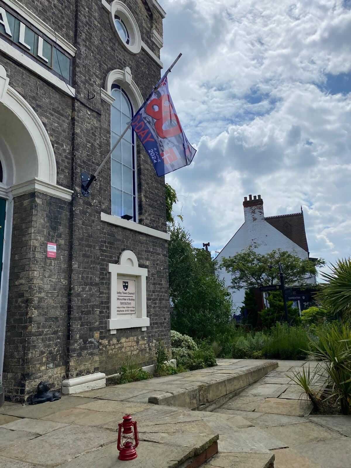 D Day flag and Lamp light of peace on D Day