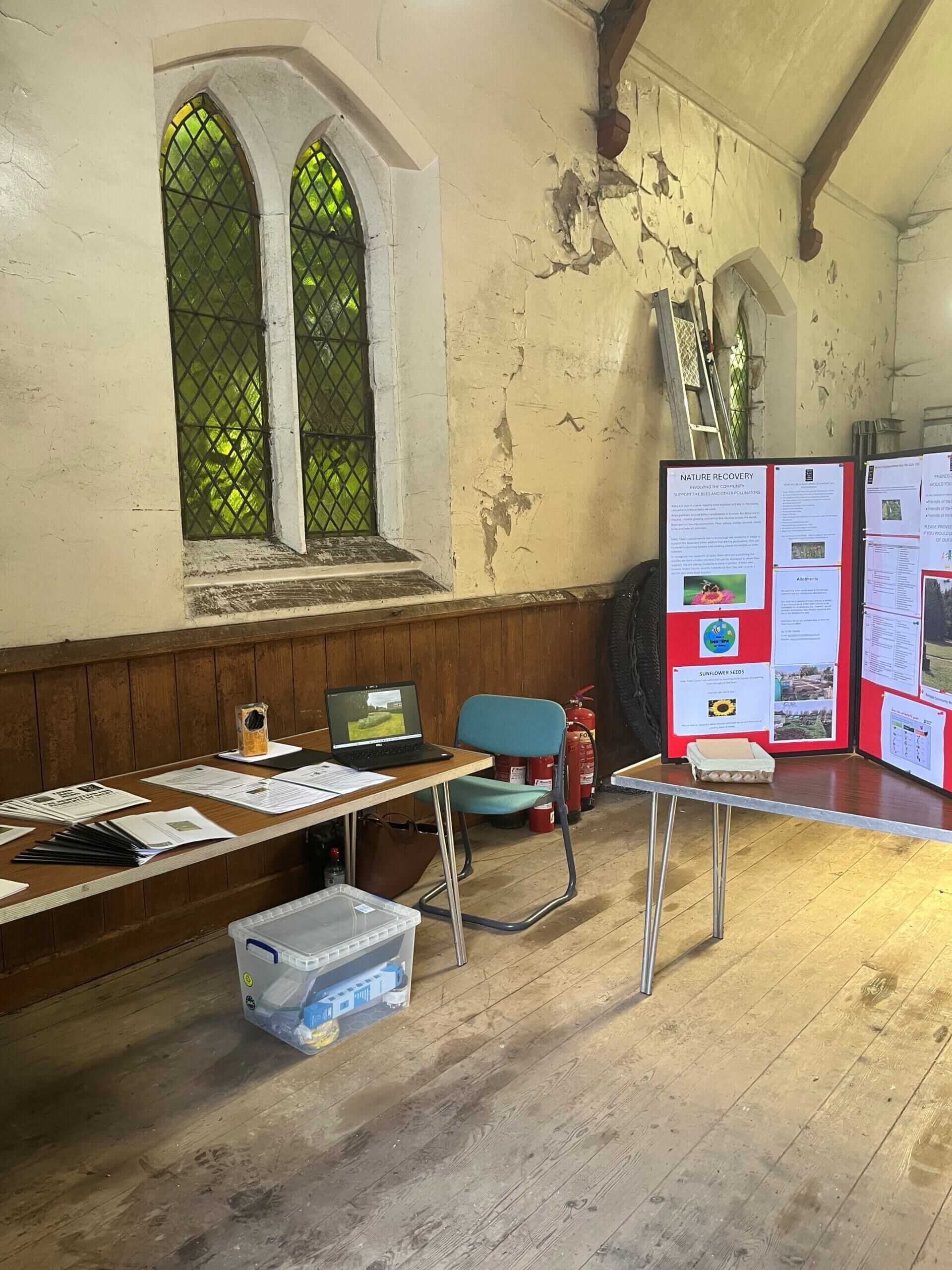 This photo shows the display for the Nature recovery drop in day inside the chapel