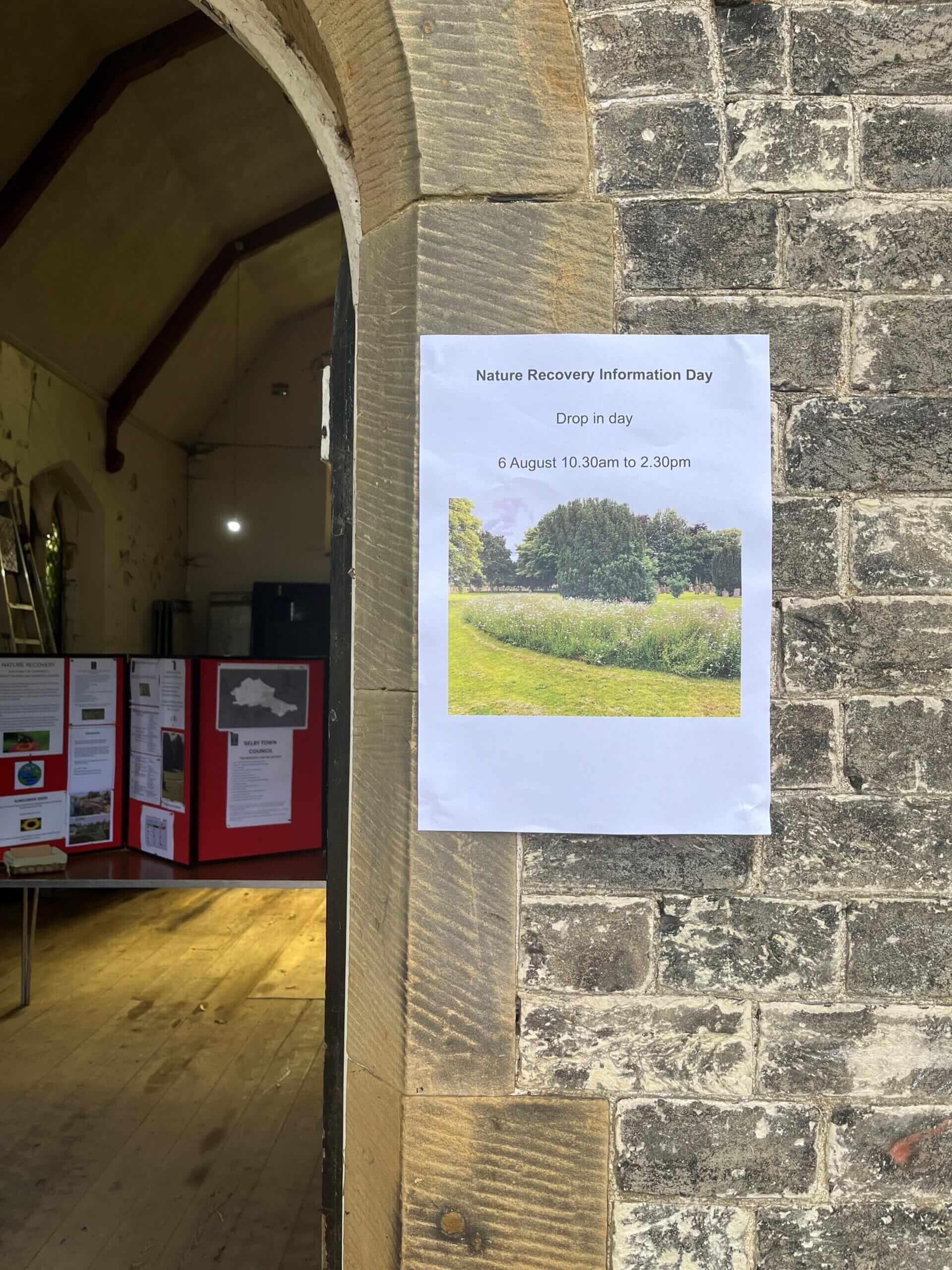 This picture shows the poster advertising the Nature Recovery drop in day held on 6 August