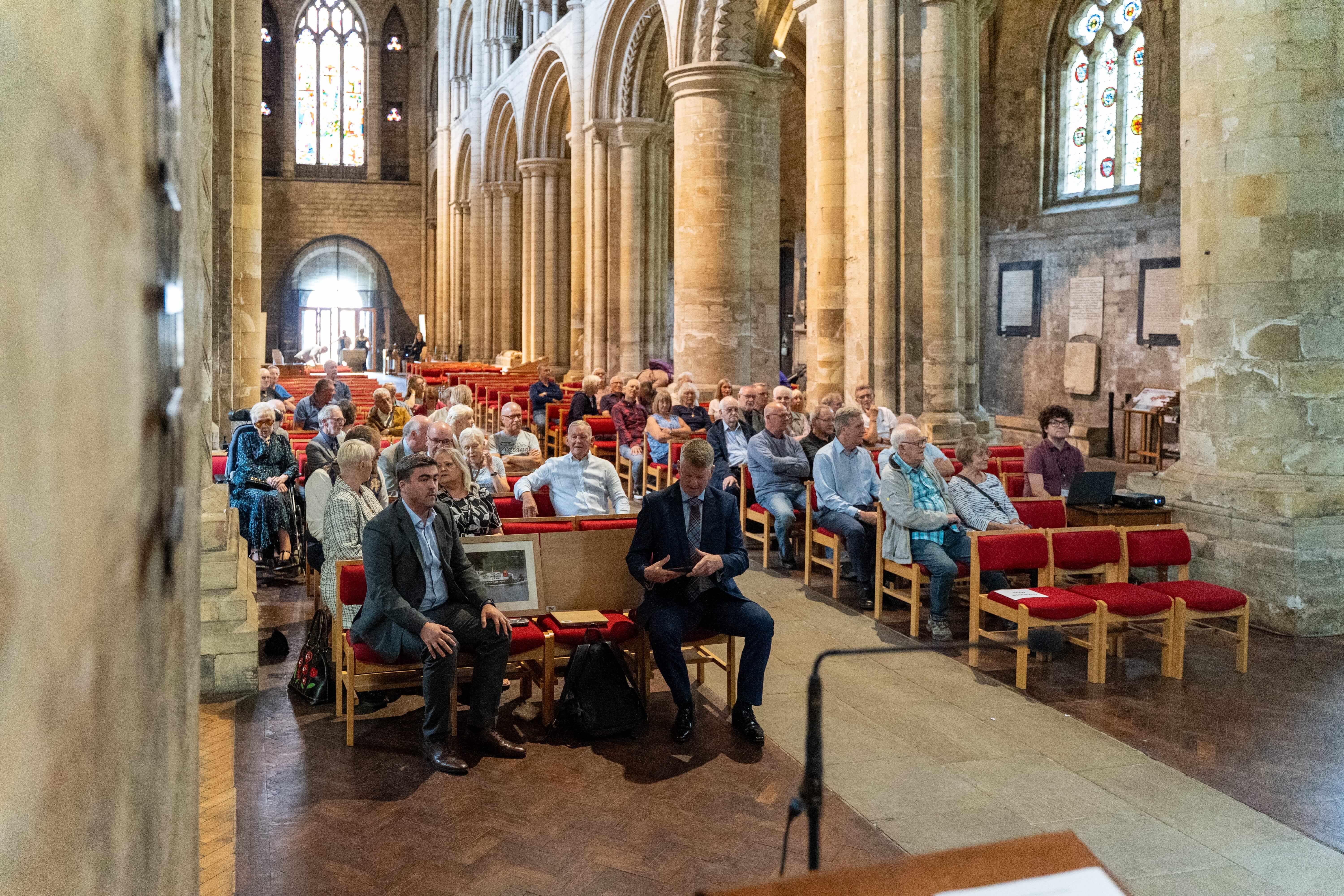 A gathering of people in Selby Abbey